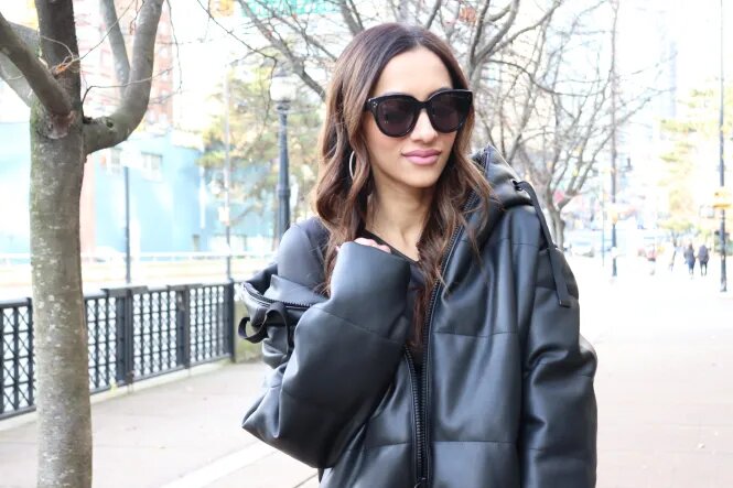 a-girl-wearing-black-puffer-leather-jacket